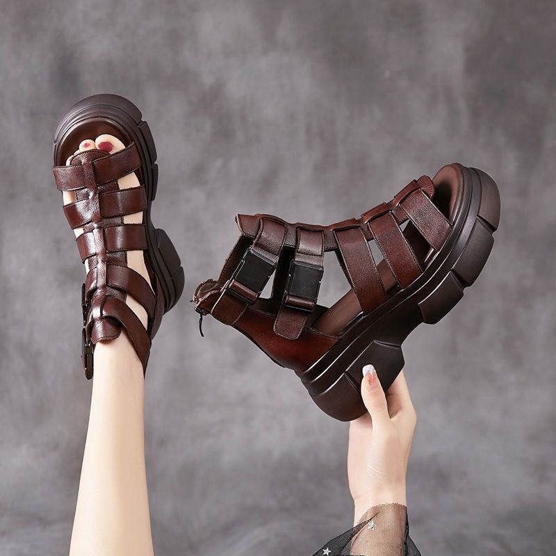 Kenike female leather hollow-out platform sandals with retro style, featuring open-toe design and chunky heel.