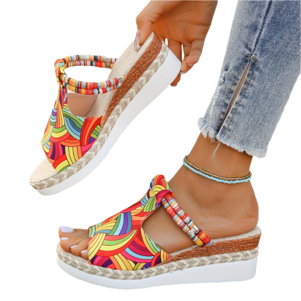 Women's colorful graffiti wedge sandals by Kenike, slip-on espadrille platform slides with braided details for summer beach outings.