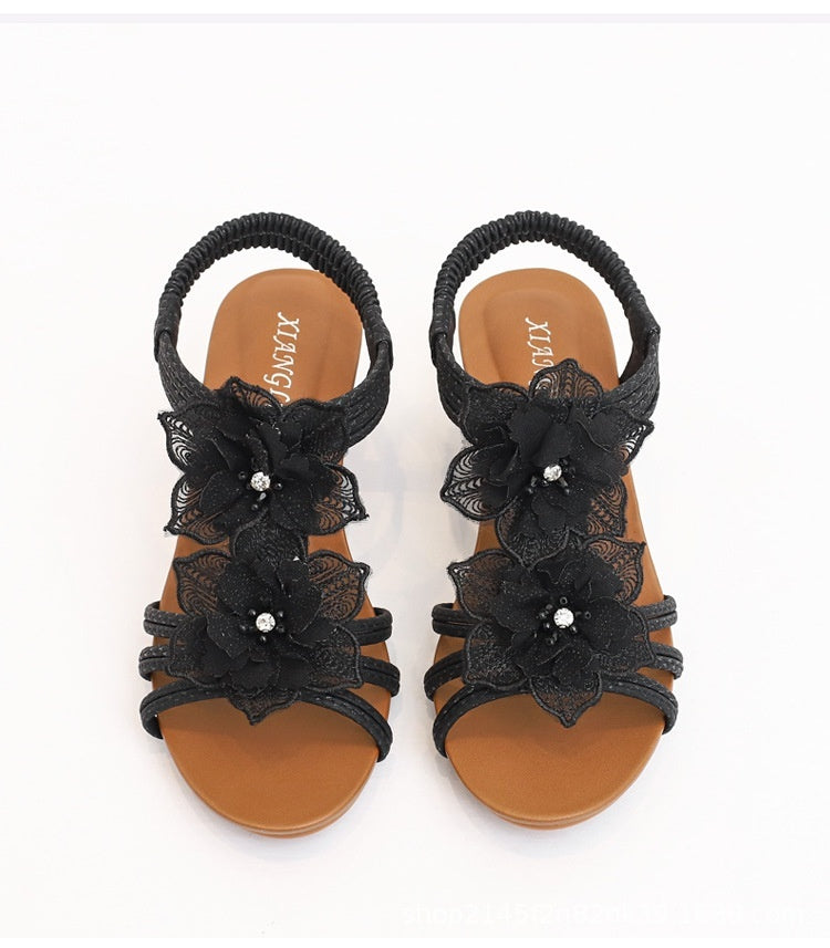 Kenike wedge Roman Bohemian retro flower vacation sandals with colorful floral design and open toe style.