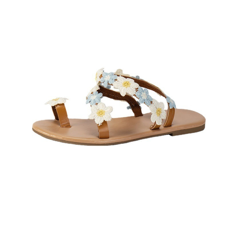 Kenike women's flat toe ring sandals with flower embellishments, stylish open-toe footwear for warm weather.