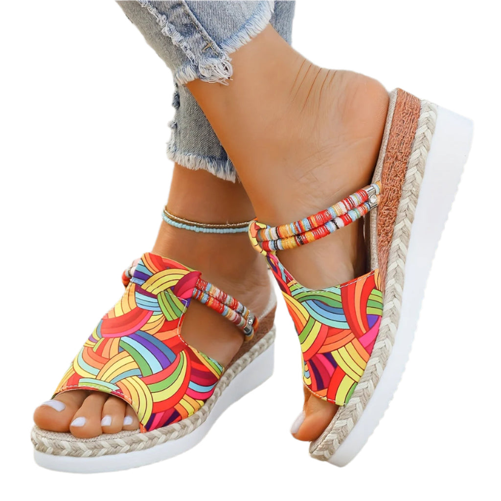 Women's colorful graffiti wedge sandals by Kenike featuring slip-on espadrille style, braided details, and high platform heels for summer.