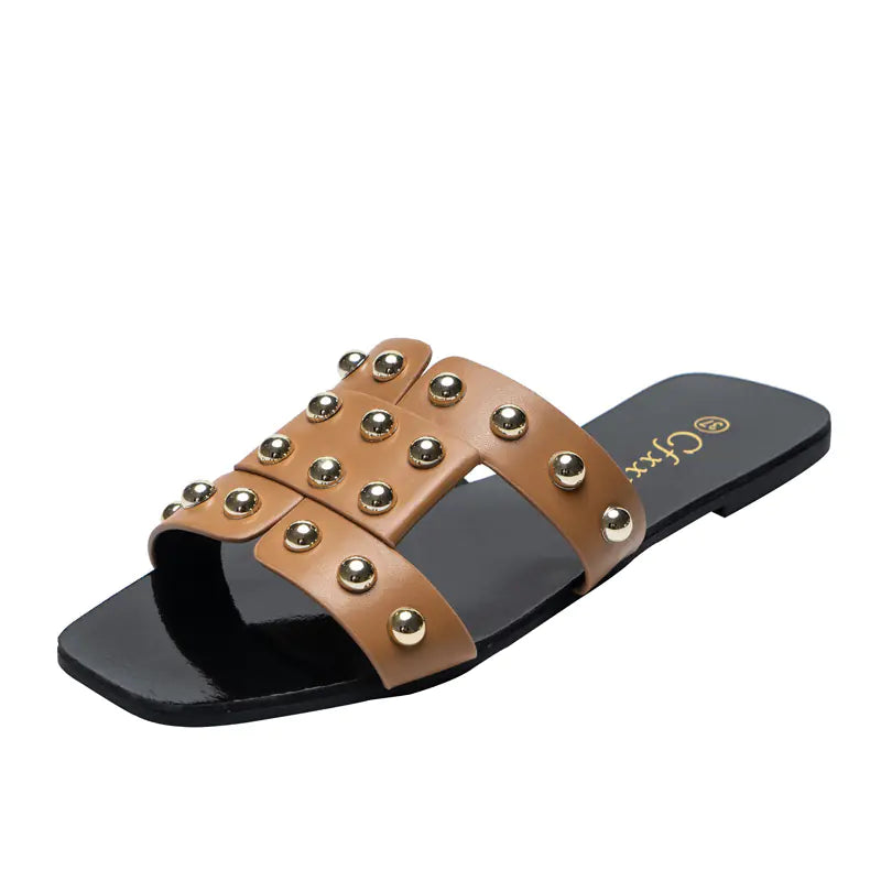 Kenike women's casual flat sandals with fashion rivet details, featuring open-toe design and comfortable slip-on style.