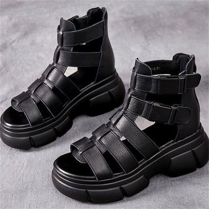 Kenike female leather hollow-out platform sandals with retro style and stylish design, featuring open-toe and ankle strap details.