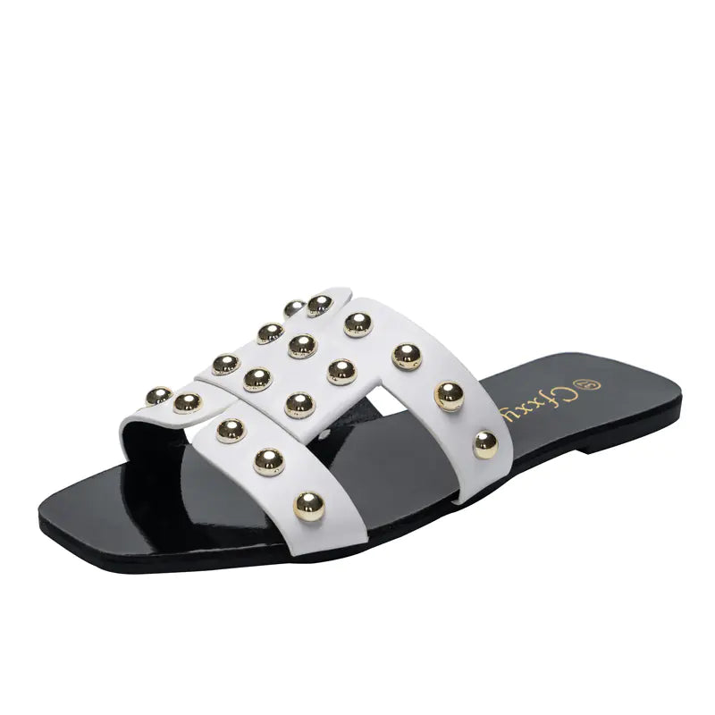 Kenike women's fashion rivet flat sandals with casual design, featuring open-toe style and adjustable straps for comfortable wear.
