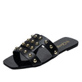 Kenike women's fashion rivet flat sandals with casual design, featuring multiple straps and metallic rivet accents.