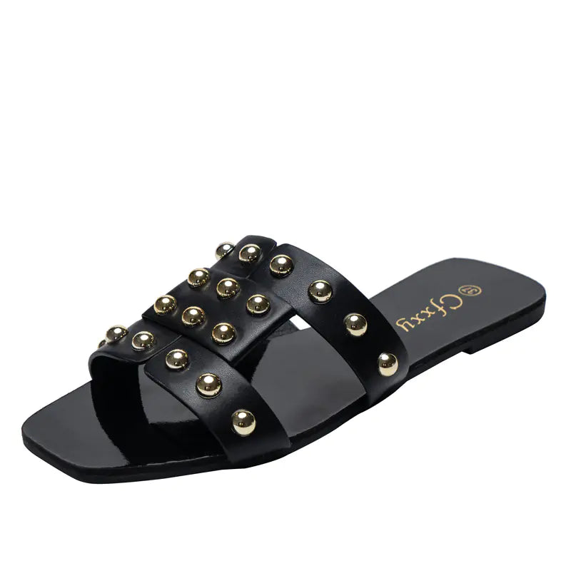 Kenike women's fashion rivet flat sandals with casual open-toe design and stylish rivet accents on tan leather straps.